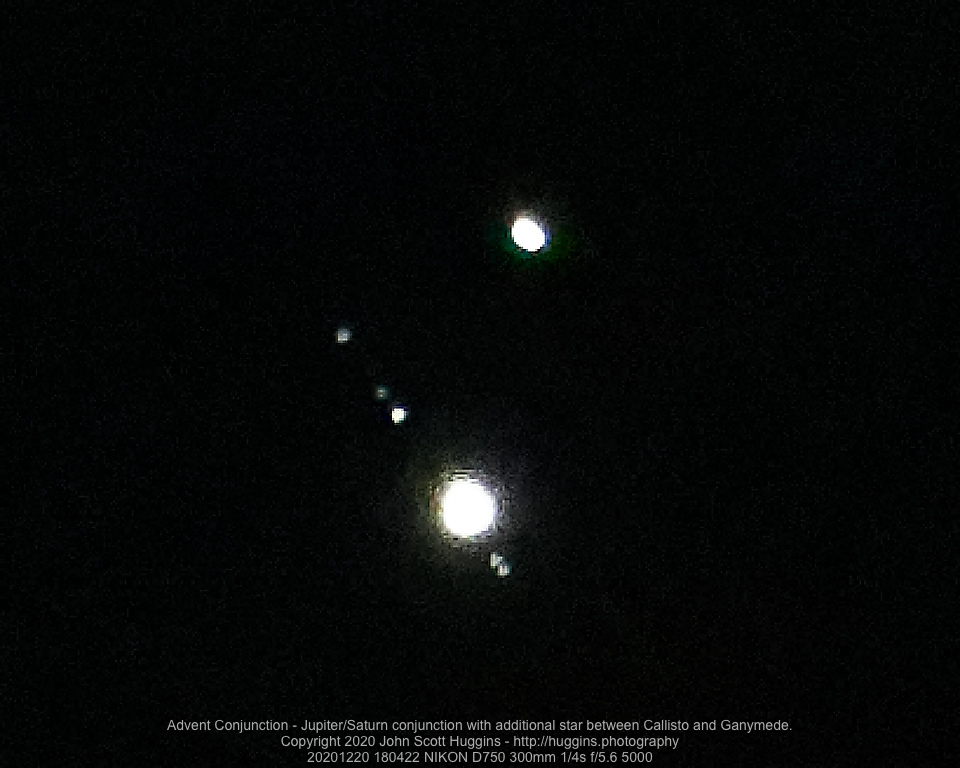 Jupiter/Saturn conjunction with additional star between Callisto and Ganymede.